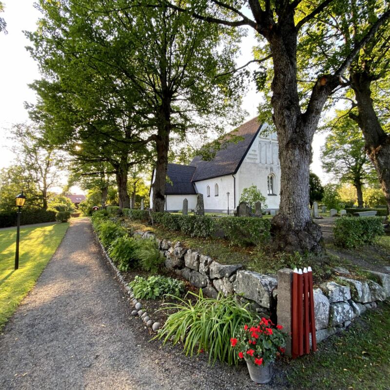 Härnevi church with the cemetery