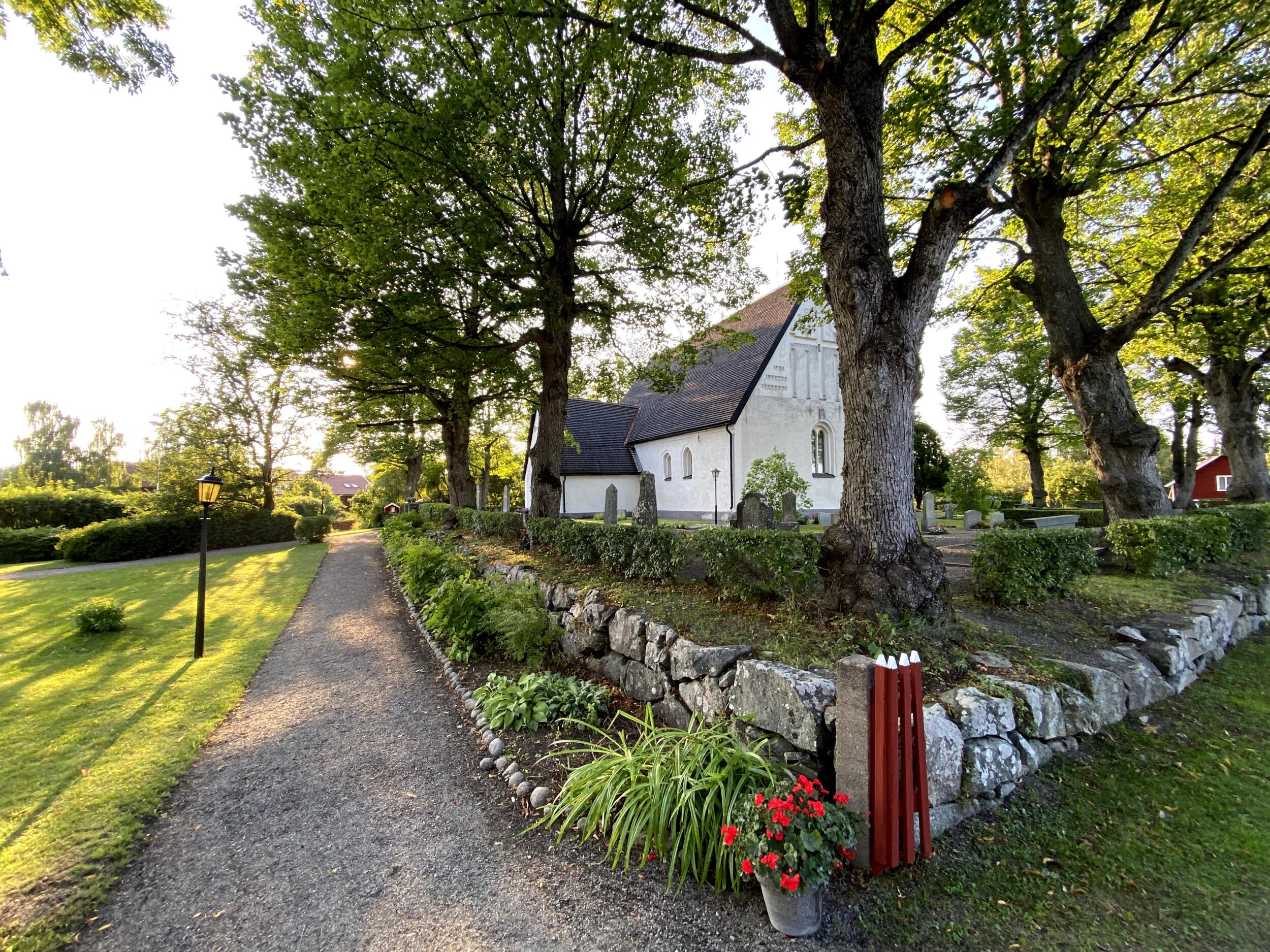 Härnevi church with the cemetery